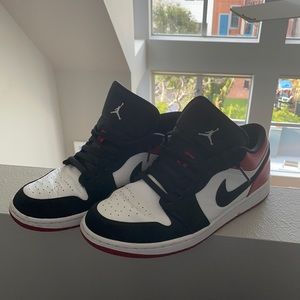 Red and black Nike Air Jordan’s